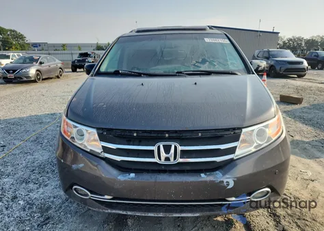 2012 Honda Odyssey Touring z USA, uszkodzony, nr VIN 5FNRL5H95CB115780